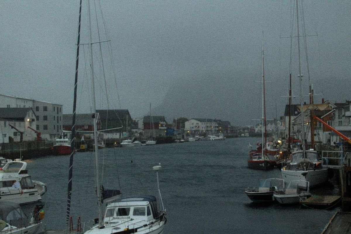 Henningsvær harbour under grey rain and wind, Lofoten